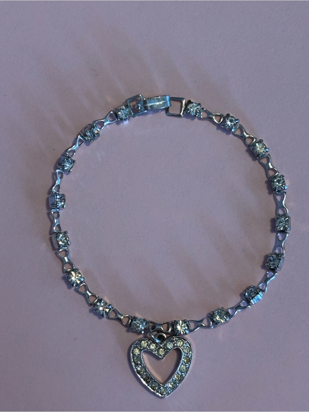 Classic 1940s–1950s rhinestone charm bracelet by the Engel Brothers.
